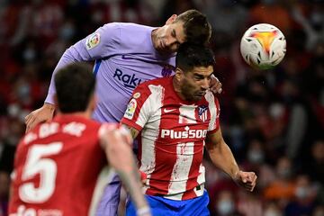  Gerard Piqué y Luis Suárez. 