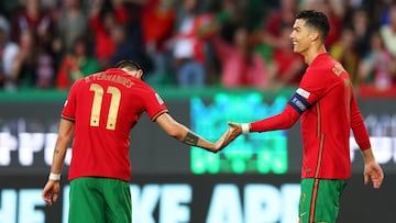 LISBON, PORTUGAL - JUNE 05: Cristiano Ronaldo of Portugal celebrates with team mate Bruno Fernandes after scoring their sides third goal during the UEFA Nations League League A Group 2 match between Portugal and Switzerland at Estadio Jose Alvalade on June 05, 2022 in Lisbon, Portugal. (Photo by Carlos Rodrigues/Getty Images)
