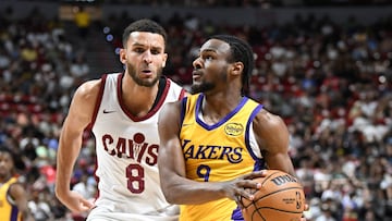 LAS VEGAS, NEVADA - JULY 18: Bronny James Jr. #9 of the Los Angeles Lakers drives past Pete Nance #8 of the Cleveland Cavaliers during a 2024 NBA Summer League game at the Thomas & Mack Center on July 18, 2024 in Las Vegas, Nevada. The Lakers defeated the Cavaliers 93-89. NOTE TO USER: User expressly acknowledges and agrees that, by downloading and or using this photograph, User is consenting to the terms and conditions of the Getty Images License Agreement. Candice Ward/Getty Images/AFP (Photo by Candice Ward / GETTY IMAGES NORTH AMERICA / Getty Images via AFP)