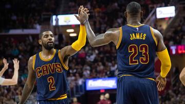 CLEVELAND, OH - NOVEMBER 03: Kyrie Irving #2 and LeBron James #23 of the Cleveland Cavaliers celebrate after scoring during the first half against the Boston Celtics at Quicken Loans Arena on November 3, 2016 in Cleveland, Ohio. NOTE TO USER: User expressly acknowledges and agrees that, by downloading and/or using this photograph, user is consenting to the terms and conditions of the Getty Images License Agreement. Mandatory copyright notice. Jason Miller/Getty Images/AFP / AFP PHOTO / GETTY IMAGES NORTH AMERICA / Jason Miller