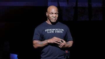 (FILES) Former US boxer Mike Tyson speaks at a press conference at the Apollo Theatre in New York, on May 13, 2024. Mike Tyson's upcoming return to the ring against YouTuber Jake Paul has been postponed after the former heavyweight champion's recent health scare, organisers said on May 31, 2024. (Photo by Kena Betancur / AFP)