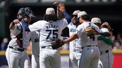 SEATTLE, WA - JULY 04: (L-R) Cal Raleigh #29 of the Seattle Mariners, Andres Munoz #75, J.P. Crawford #3, Josh Rojas #4 and Ryan Bliss #1 celebrate after a game against the Baltimore Orioles at T-Mobile Park on July 4, 2024 in Seattle, Washington. The Mariners won 7-3.   Stephen Brashear/Getty Images/AFP (Photo by STEPHEN BRASHEAR / GETTY IMAGES NORTH AMERICA / Getty Images via AFP)