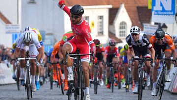 's Nacer Bouhanni celebrates his victory as he crosses the finish line of the 72nd edition of the "Nokere Koerse - Danilith Classic" cycling race, on March 15, 2017 in Kruishoutem. / AFP PHOTO / BELGA AND Belga / DAVID STOCKMAN / Belgium OUT