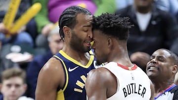 INDIANAPOLIS, INDIANA - JANUARY 08: Jimmy Butler #22 of the Miami Heat and T.J. Warren #1 of the Indiana Pacers get involved in an argument during the game at Bankers Life Fieldhouse on January 08, 2020 in Indianapolis, Indiana. NOTE TO USER: User expressly acknowledges and agrees that, by downloading and or using this photograph, User is consenting to the terms and conditions of the Getty Images License Agreement.   Andy Lyons/Getty Images/AFP
 == FOR NEWSPAPERS, INTERNET, TELCOS &amp; TELEVISION USE ONLY ==
