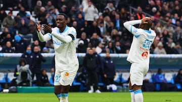 Timothy Weah y Hamed Traore.