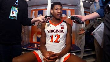 MINNEAPOLIS, MINNESOTA - APRIL 04: De&#039;Andre Hunter #12 of the Virginia Cavaliers speaks to the media in the locker room prior to the 2019 NCAA Tournament Final Four at U.S. Bank Stadium on April 4, 2019 in Minneapolis, Minnesota.   Mike Lawrie/Getty Images/AFP
 == FOR NEWSPAPERS, INTERNET, TELCOS &amp; TELEVISION USE ONLY ==