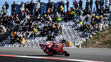 Ducati Lenovo's Italian rider Francesco Bagnaia rides during the MotoGP qualification race of the Portuguese Grand Prix at the Algarve International Circuit in Portimao, on November 6, 2021. (Photo by PATRICIA DE MELO MOREIRA / AFP)