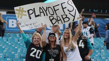 JACKSONVILLE, FL - DECEMBER 17: Jacksonville Jaguars fans pose in the stands after the Jaguars defeated the Houston Texans 45-7 at EverBank Field on December 17, 2017 in Jacksonville, Florida. Sam Greenwood/Getty Images/AFP
== FOR NEWSPAPERS, INTERNET, TELCOS & TELEVISION USE ONLY ==