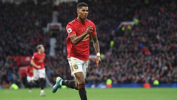 MANCHESTER, ENGLAND - NOVEMBER 10: Marcus Rashford of Manchester United celebrates after scoring his team's third goal during the Premier League match between Manchester United and Brighton & Hove Albion at Old Trafford on November 10, 2019 in Ma