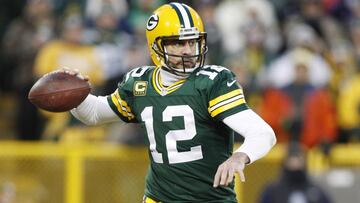 Jan 8, 2017; Green Bay, WI, USA;  Green Bay Packers quarterback Aaron Rodgers (12) throws a pass against the New York Giants during the first half in the NFC Wild Card playoff football game at Lambeau Field. Mandatory Credit: Jeff Hanisch-USA TODAY Sports