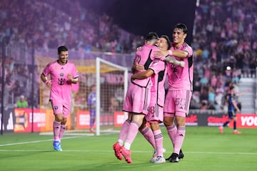 Inter Miami forward Lionel Messi (10) celebrates a goal with defender Jordi Alba (18) and midfielder Federico Redondo (55).