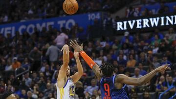 Mar 16, 2019; Oklahoma City, OK, USA; Golden State Warriors guard Stephen Curry (30) shoots a three point basket as Oklahoma City Thunder forward Jerami Grant (9) defends during the first half at Chesapeake Energy Arena. Mandatory Credit: Alonzo Adams-USA TODAY Sports