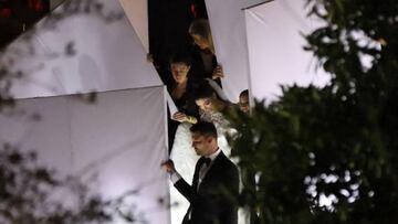 MIAMI, FLORIDA - January 28: Nadia Ferreira wears a sparkling white wedding dress and carries white orchids as she descends the stairs at the Perez Art Museum to marry Marc Anthony on January 28, 2023 in Miami. (Photo by MEGA/GC Images)