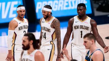 Mar 21, 2021; Denver, Colorado, USA; New Orleans Pelicans forward Brandon Ingram (14) reacts with guard Josh Hart (3) and forward Zion Williamson (1) in the fourth quarter against the Denver Nuggets at Ball Arena. Mandatory Credit: Isaiah J. Downing-USA TODAY Sports