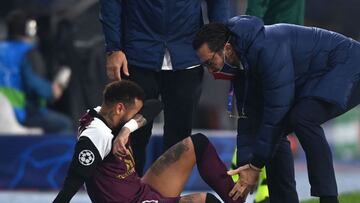 Paris Saint-Germain&#039;s Brazilian forward Neymar receives medical treatment from medical staff during the UEFA Champions League Group H football match between Istanbul Basaksehir FK and Paris Saint-Germain&#039;s, on October 28, 2020, at the Basaksehir