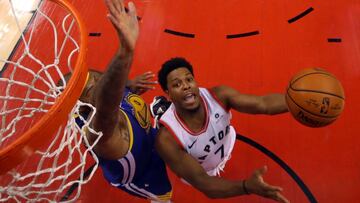 Jun 2, 2019; Toronto, Ontario, CAN; Toronto Raptors guard Kyle Lowry (7) shoots the ball against Golden State Warriors center DeMarcus Cousins (0) in game two of the 2019 NBA Finals at Scotiabank Arena. Mandatory Credit: Kyle Terada-USA TODAY Sports