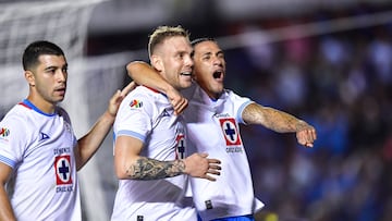 Carlos Rotondi celebrates his goal 0-1 with Erik Lira and Uriel Antuna of Cruz Azul during the 5th round match between Queretaro and Cruz Azul as part of the Liga BBVA MX, Torneo Apertura 2024 at La Corregidora Stadium on August 23, 2024 in Santiago de Queretaro, Mexico.