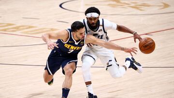 DENVER, CO - JANUARY 17: Facundo Campazzo #7 of the Denver Nuggets defends against Mike Conley #10 of the Utah Jazz at Ball Arena on January 17, 2021 in Denver, Colorado. NOTE TO USER: User expressly acknowledges and agrees that, by downloading and/or using this photograph, user is consenting to the terms and conditions of the Getty Images License Agreement   Jamie Schwaberow/Getty Images/AFP
 == FOR NEWSPAPERS, INTERNET, TELCOS &amp; TELEVISION USE ONLY ==