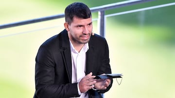 Barcelona's Argentinian forward Kun Aguero reacts as he addresses a press conference to announce his retirement from football, at the Camp Nou stadium in Barcelona, on December 15, 2021. (Photo by Pau BARRENA / AFP)