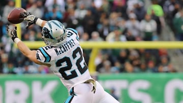 EAST RUTHERFORD, NJ - NOVEMBER 26: Running back Christian McCaffrey #22 of the Carolina Panthers reaches for a catch during the second half of the game at MetLife Stadium on November 26, 2017 in East Rutherford, New Jersey.   Abbie Parr/Getty Images/AFP
 == FOR NEWSPAPERS, INTERNET, TELCOS &amp; TELEVISION USE ONLY ==