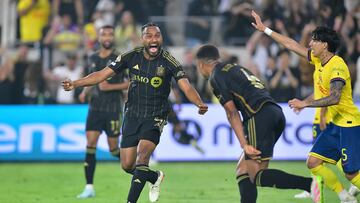 May 31, 2025; Los Angeles, California, USA; LAFC midfielder Igor Jesus (6) celebrates with defender Eddie Segura (4) after scoring a goal against Club America in the second half during a playoff match of the 2025 FIFA Club World Cup at BMO Stadium. Mandatory Credit: Gary A. Vasquez-Imagn Images