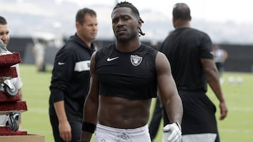 FILE - In this Aug. 20, 2019, file photo, Oakland Raiders&#039; Antonio Brown walks off the field after NFL football practice in Alameda, Calif. Star receiver Antonio Brown is not with the Oakland Raiders four days before the season opener amid reports he could be suspended over a confrontation with general manager Mike Mayock.
 Mayock issued a brief statement at the beginning of practice Thursday, Sept. 5, 2019, saying that Brown wasn&#039;t at the Raiders facility and won&#039;t be practicing a day after Brown posted a letter from the GM on social media detailing nearly $54,000 in fines. (AP Photo/Jeff Chiu, File)