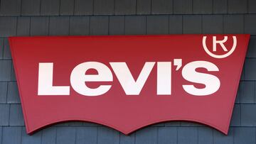 FILE PHOTO: The signage of Levi Strauss & Co. store is seen at the Woodbury Common Premium Outlets in Central Valley, New York, U.S., February 15, 2022. REUTERS/Andrew Kelly/File Photo