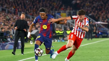 Ruggeri con Lamine, en el Barça-Atleti de Champions.