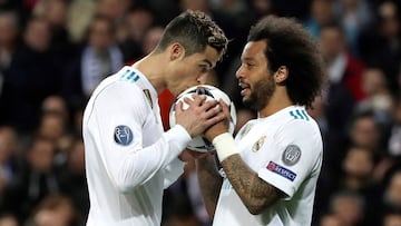 Cristiano y Marcelo celebran uno de los goles del Madrid.