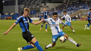 Aug 5, 2025; Montreal, QC, Canada; CF Montreal midfielder Hennandii Synchuk (18) plays the ball and Puebla FC defender Fernando Monarrez (7) defends during the first half at Stade Saputo. Mandatory Credit: Eric Bolte-Imagn Images