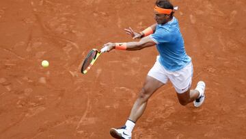 Rafael Nadal of Spain serves to David Ferrer of Spain during his men's singles match at the Barcelona Open Tennis Tournament in Barcelona, Spain, Thursday, April 25, 2019