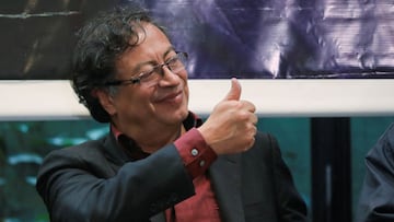 FILE PHOTO: Colombian left-wing presidential candidate Gustavo Petro reacts during a meeting with persons with disabilities, ahead of the second round of the presidential election in Bogota, Colombia June 8, 2022. REUTERS/Luisa Gonzalez/File Photo