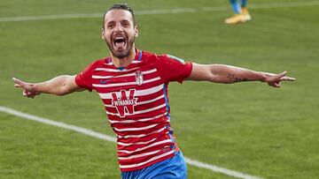 GRANADA, SPAIN - DECEMBER 20: Roberto Soldado of Granada CF celebrates after scoring his team's second goal during the La Liga Santander match between Granada CF and Real Betis at Estadio Nuevo Los Carmenes on December 20, 2020 in Granada, Spain. (Ph