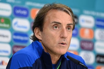 This handout photo taken and released by UEFA on July 10, 2021, shows Italy's coach Roberto Mancini giving an MD-1 official press conference at the Tottenham Hotspur Training Centre in Enfield, north of London, on the eve of their UEFA EURO 2020 final foo