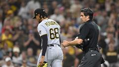 SAN DIEGO, CA - JULY 25: Angel Perdomo #68 of the Pittsburgh Pirates leaves the game after being ejected as umpire John Tumpane looks on during the seventh inning of a baseball game against the San Diego Padres July 25, 2023 at Petco Park in San Diego, California.   Denis Poroy/Getty Images/AFP (Photo by DENIS POROY / GETTY IMAGES NORTH AMERICA / Getty Images via AFP)