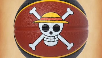 Promotional image for the One Piece x Spalding collaboration, featuring Devil Fruit-themed basketballs for Luffy, Ace, and Chopper, alongside branded apparel and accessories set against a stylized court backdrop.
