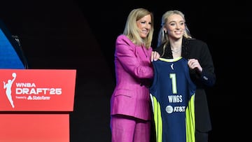 WNBA commissionner Cathy Engelbert (L) welcomes Paige Bueckers as number one pick during the 2025 WNBA Draft at the Shed in New York City on April 14, 2025.
