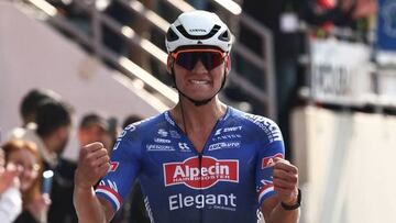 Alpecin-Deceuninck team's Dutch rider Mathieu Van Der Poel celebrates as he cycles to the finish line to win the 120th edition of the Paris-Roubaix one-day classic cycling race, between Compiegne and Roubaix, northern France, on April 9, 2023. (Photo by Anne-Christine POUJOULAT / AFP) (Photo by ANNE-CHRISTINE POUJOULAT/AFP via Getty Images)