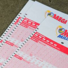 What are the winning numbers for Friday’s $57 million Mega Millions jackpot?