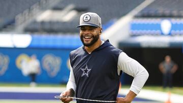 INGLEWOOD, CALIFORNIA - OCTOBER 09: Dak Prescott #4 of the Dallas Cowboys reacts as he warms up prior to a game against the Los Angeles Rams at SoFi Stadium on October 09, 2022 in Inglewood, California. (Photo by Michael Owens/Getty Images)