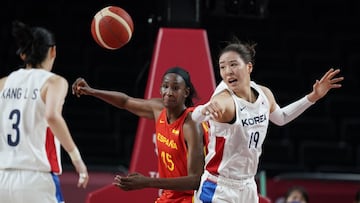 South Korea&#039;s Ji Su Park (19), right, and Spain&#039;s Astou Ndour (45) fight to take control of the ball during women&#039;s basketball preliminary round game at the 2020 Summer Olympics, Monday, July 26, 2021, in Saitama, Japan. (AP Photo/Charlie Neibergall)