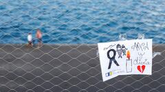 A sign placed on a fence in memory of the missing girls in the Canary Islands is seen in Santa Cruz de Tenerife, Spain June 11, 2021. REUTERS/Borja Suarez