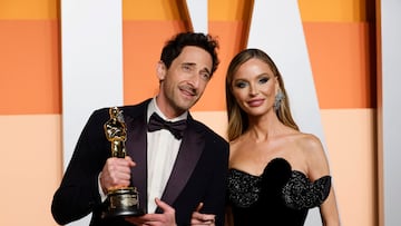 Adrien Brody and Georgina Chapman arrive at the Vanity Fair Oscars party after the 97th Academy Awards, in Beverly Hills, California, U.S., March 2, 2025. REUTERS/Danny Moloshok