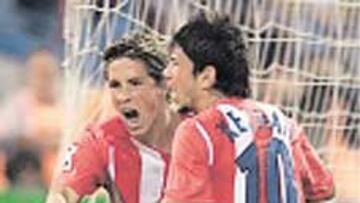 Torres y Kezman, líderes.