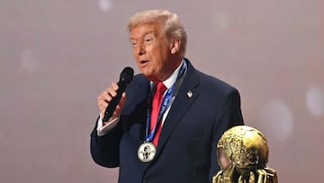 US President Trump speaks as he receives the FIFA Peace Prize during the draw for the 2026 FIFA Football World Cup taking place in the US, Canada and Mexico, at the Kennedy Center, in Washington, DC, on December 5, 2025. (Photo by Mandel NGAN / POOL / AFP)