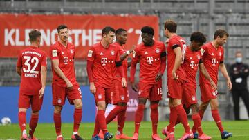 Bayern Munich&#039;s Canadian midfielder Alphonso Davies (4thR) celebrates scoring his team&#039;s forth goal with teammates during the German first division Bundesliga football match between FC Bayern Munich and Eintracht Frankfurt on May 23, 2020 in Mun