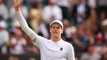 Italy's Jannik Sinner celebrates after winning against US player Ben Shelton during their men's singles quarter-final tennis match on the tenth day of the 2025 Wimbledon Championships at The All England Lawn Tennis and Croquet Club in Wimbledon, southwest London, on July 9, 2025. (Photo by HENRY NICHOLLS / AFP) / RESTRICTED TO EDITORIAL USE
