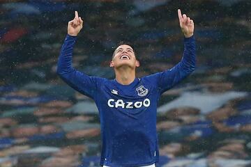 Everton's Colombian midfielder James Rodriguez celebrates after scoring his second goal, their fourth during the English Premier League football match between Everton and Brighton Hove and Albion at Goodison Park in Liverpool, north west England on Octobe