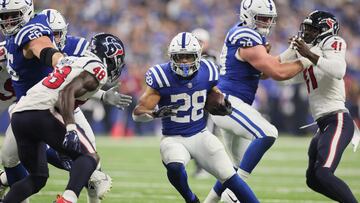 INDIANAPOLIS, INDIANA - JANUARY 06: Jonathan Taylor #28 of the Indianapolis Colts runs with the ball during the first quarter against the Houston Texans at Lucas Oil Stadium on January 06, 2024 in Indianapolis, Indiana.   Andy Lyons/Getty Images/AFP (Photo by ANDY LYONS / GETTY IMAGES NORTH AMERICA / Getty Images via AFP)