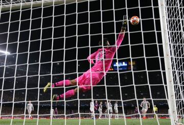 Alisson Becker unable to save Messi's free-kick, placed right inside the top corner.